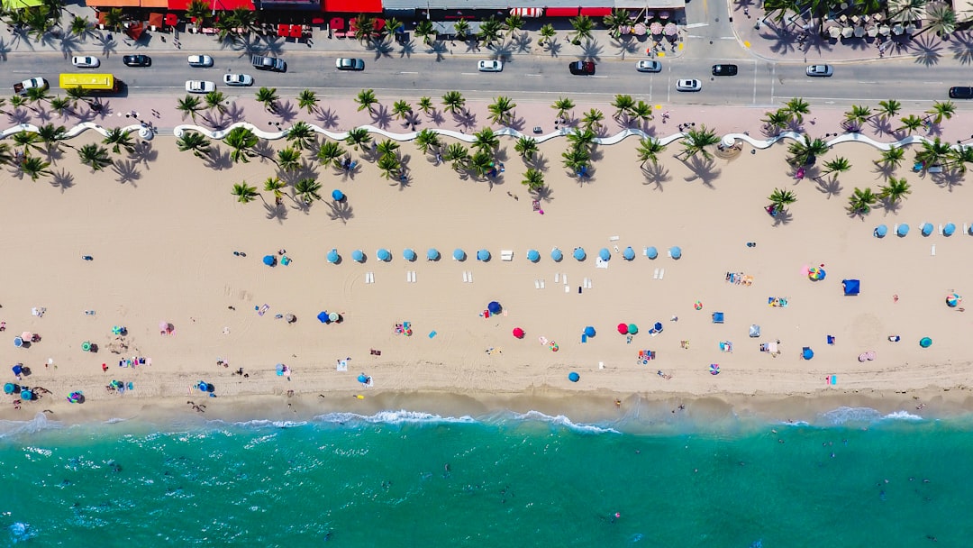 Floridas Streets
Asper Productions Drone Photo by Lance Asper by Jax Facts aerial photography of coastline with people