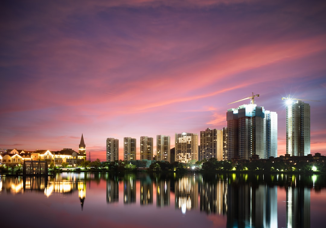 A view of a city at night from across the water