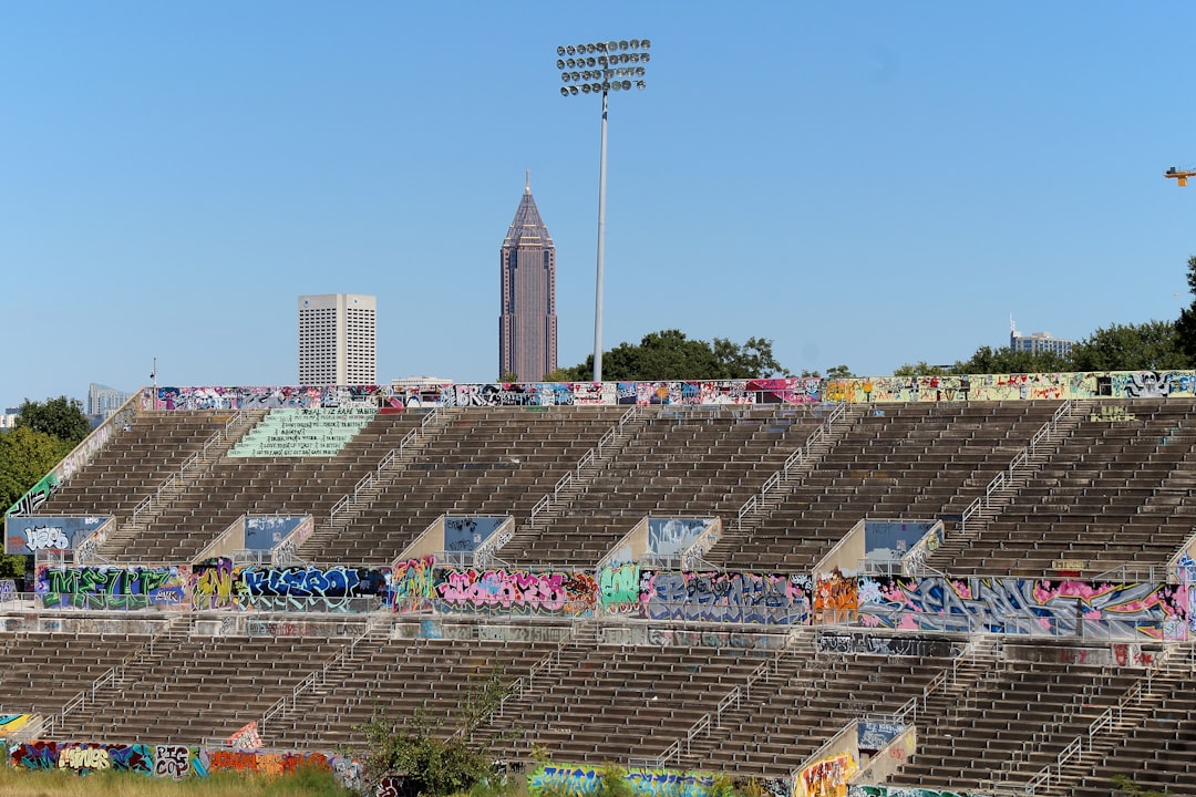 a stadium with graffiti on the side of it